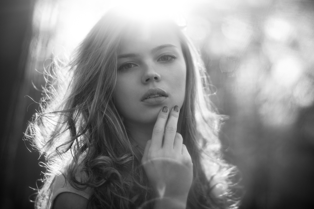 Backlit woman outside BW