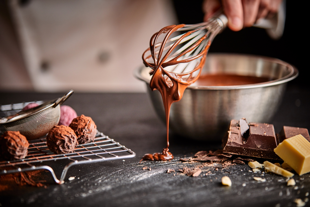 Baker preparing chocolates