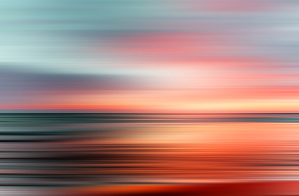 motion blur sunset colors on ocean horizon
